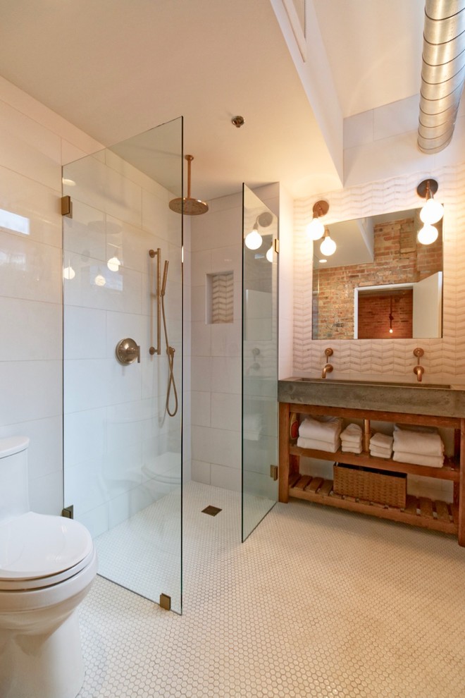 This is an example of a medium sized urban ensuite bathroom in Chicago with open cabinets, dark wood cabinets, a walk-in shower, a one-piece toilet, white tiles, porcelain tiles, multi-coloured walls, a trough sink, concrete worktops, white floors and an open shower.