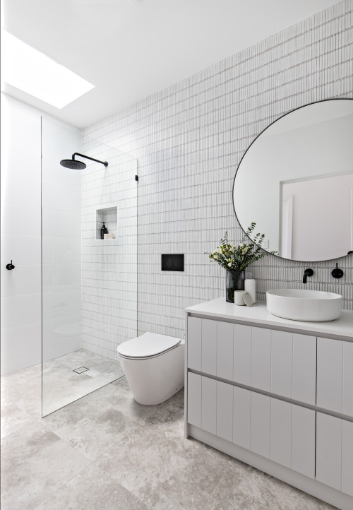 Timeless Contrast: White Bathroom Elegance Enhanced by Black Fixtures