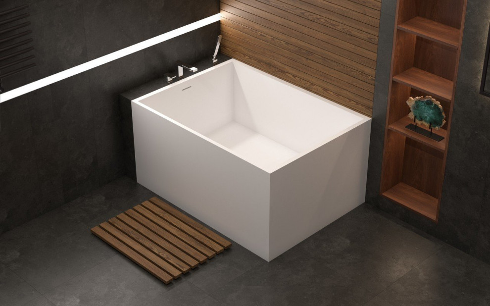 Foto di una stanza da bagno padronale classica di medie dimensioni con nessun'anta, vasca freestanding, piastrelle grigie, pareti grigie, lavabo integrato e pavimento grigio