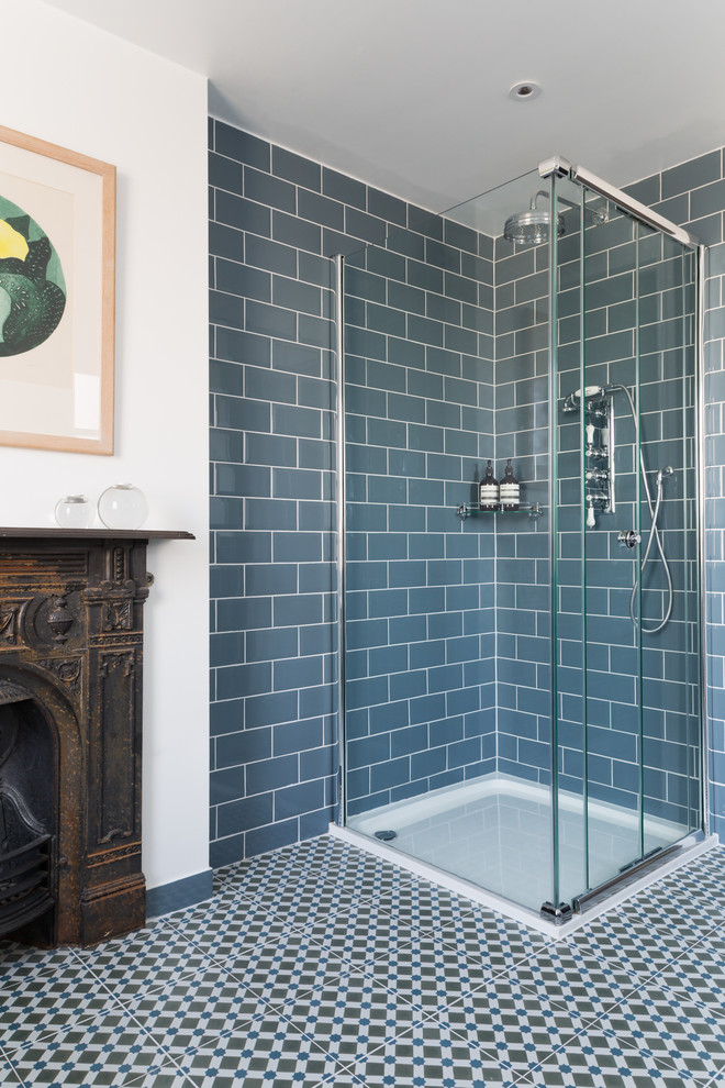 Photo of a contemporary bathroom in London with a sliding door and a chimney breast.