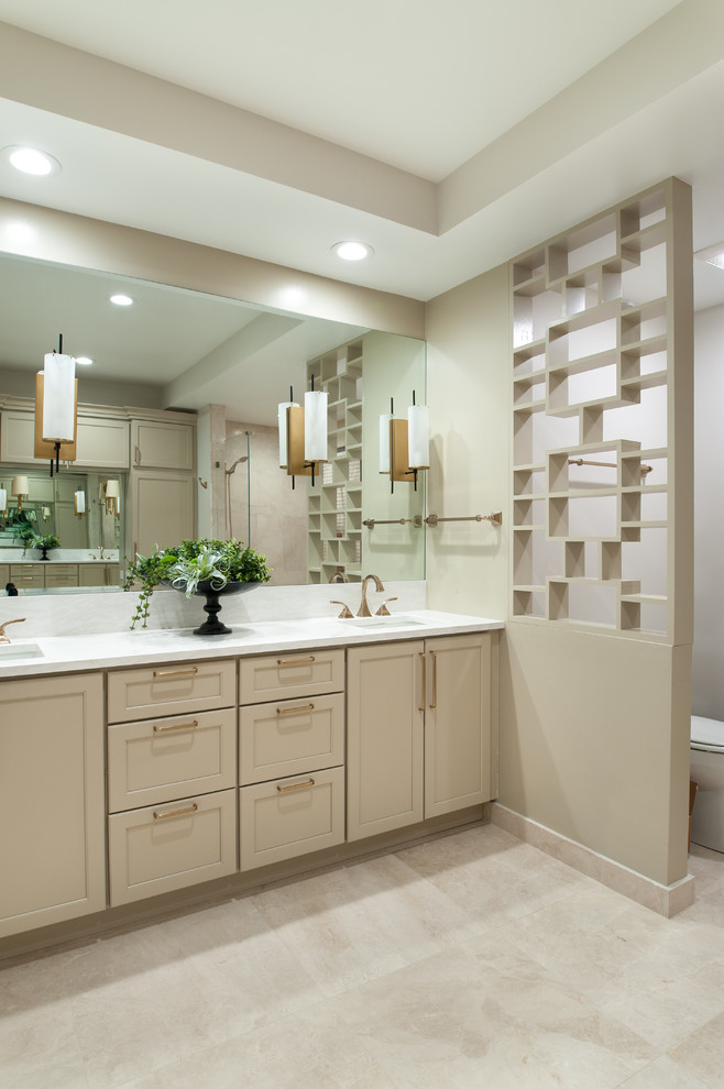 Design ideas for a large classic ensuite bathroom in Detroit with recessed-panel cabinets, beige cabinets, a corner shower, beige walls, porcelain flooring, a submerged sink, beige floors, a hinged door and white worktops.