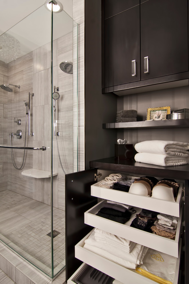 Inspiration for a large transitional master beige tile and ceramic tile ceramic tile and beige floor alcove shower remodel in Minneapolis with flat-panel cabinets, black cabinets, a one-piece toilet, gray walls, an undermount sink, quartz countertops and white countertops