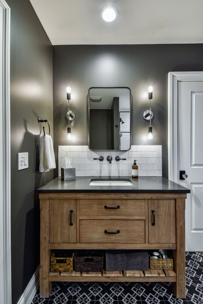 Medium sized classic bathroom in Chicago with flat-panel cabinets, distressed cabinets, an alcove shower, a two-piece toilet, black tiles, ceramic tiles, black walls, cement flooring, a submerged sink, engineered stone worktops, white floors, a hinged door, grey worktops, a shower bench, a single sink and a freestanding vanity unit.