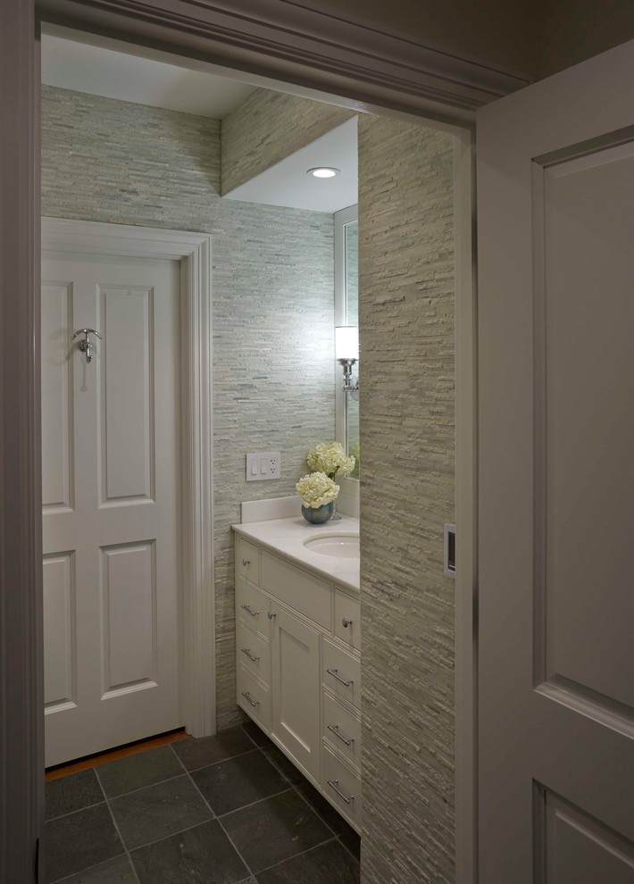 Photo of a small classic family bathroom in Jacksonville with a submerged sink, beaded cabinets, white cabinets, marble worktops, an alcove bath, a shower/bath combination, a one-piece toilet, green tiles, stone tiles, green walls and slate flooring.