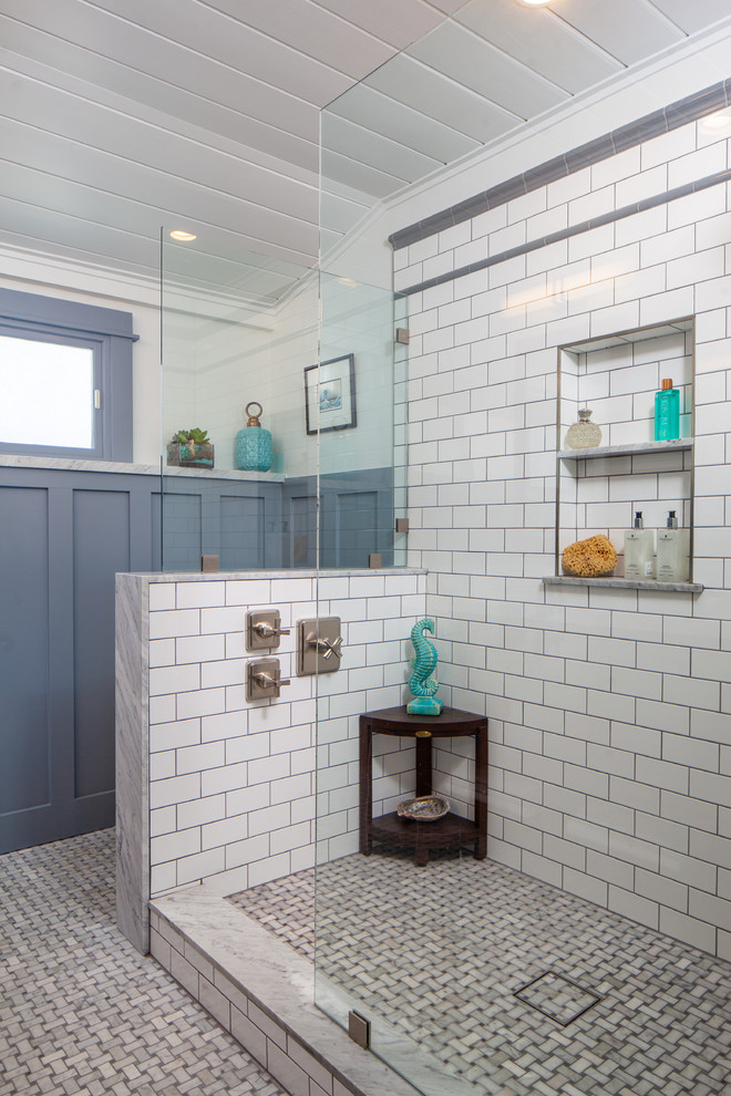 Inspiration for a craftsman mosaic tile floor and gray floor bathroom remodel in San Diego with shaker cabinets, medium tone wood cabinets, a two-piece toilet, gray walls, an undermount sink, marble countertops and white countertops