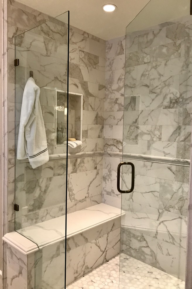 Inspiration for a large classic ensuite bathroom in San Diego with beaded cabinets, beige cabinets, an alcove shower, a one-piece toilet, white tiles, stone slabs, grey walls, marble flooring, a submerged sink, engineered stone worktops, white floors and a hinged door.