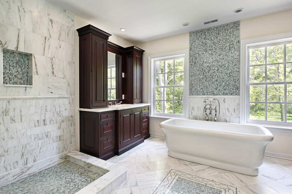Large transitional master white tile and stone tile marble floor bathroom photo in Atlanta with an undermount sink, beaded inset cabinets, dark wood cabinets, marble countertops, a one-piece toilet and multicolored walls