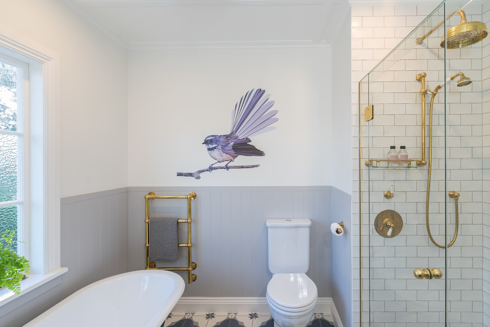 Bathroom - mid-sized transitional kids' bathroom idea in Auckland with furniture-like cabinets