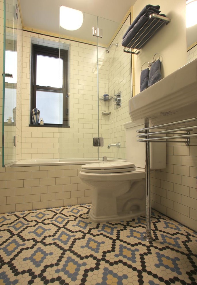 Design ideas for a medium sized traditional shower room bathroom in New York with open cabinets, a two-piece toilet, white walls, ceramic flooring and a pedestal sink.