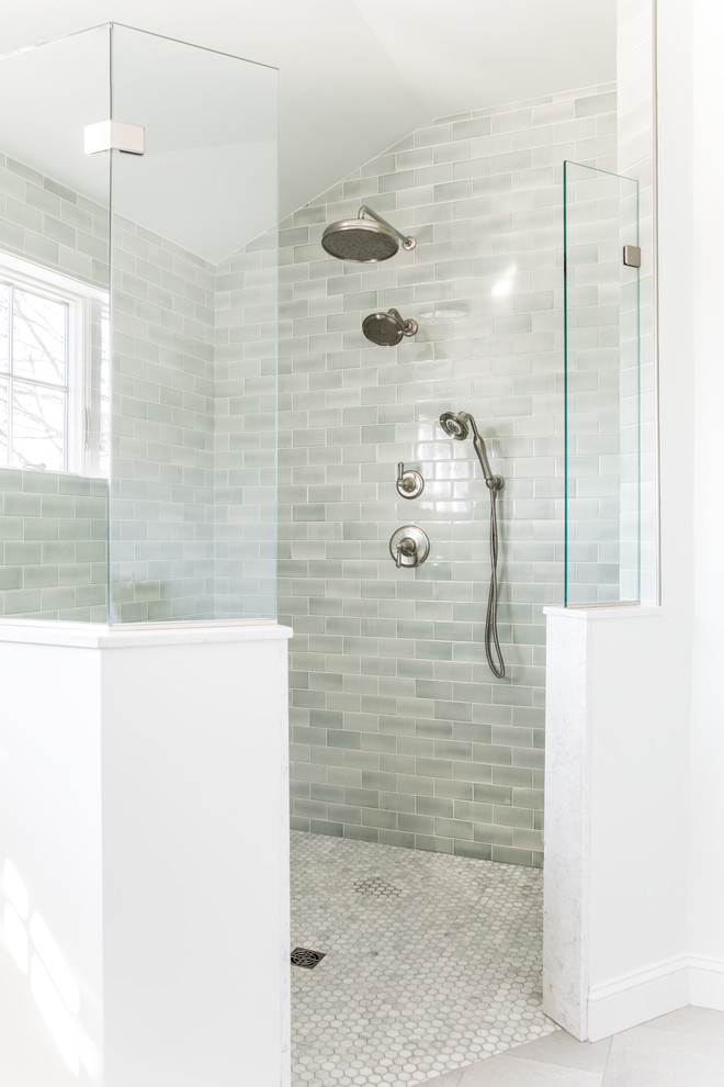 Classic ensuite bathroom in Boston with recessed-panel cabinets, white cabinets, a freestanding bath, a built-in shower, a one-piece toilet, green tiles, ceramic tiles, marble flooring, a submerged sink, marble worktops, grey floors, an open shower and grey worktops.