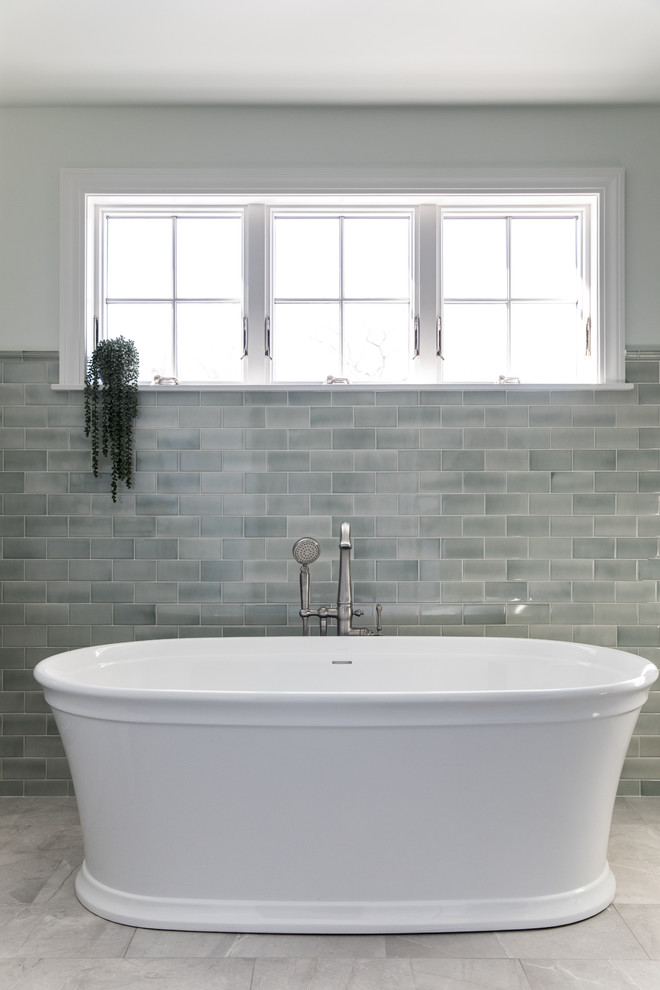 Traditional ensuite bathroom in Boston with recessed-panel cabinets, white cabinets, a freestanding bath, a built-in shower, a one-piece toilet, green tiles, ceramic tiles, marble flooring, a submerged sink, marble worktops, grey floors, an open shower and grey worktops.