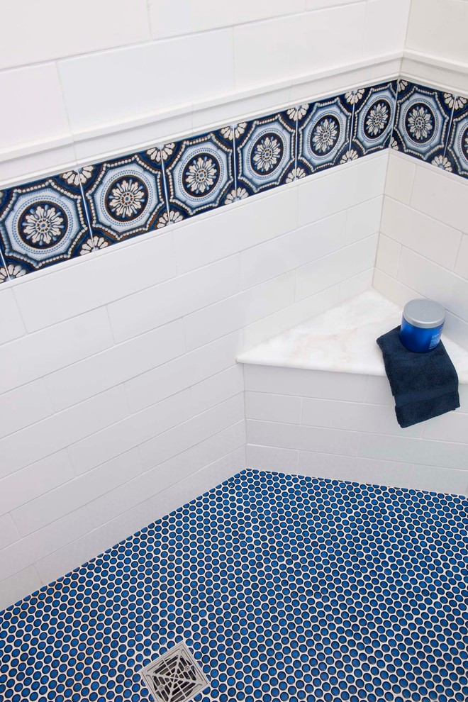 Bathroom - mediterranean bathroom idea in San Diego with an undermount sink, white cabinets and white walls