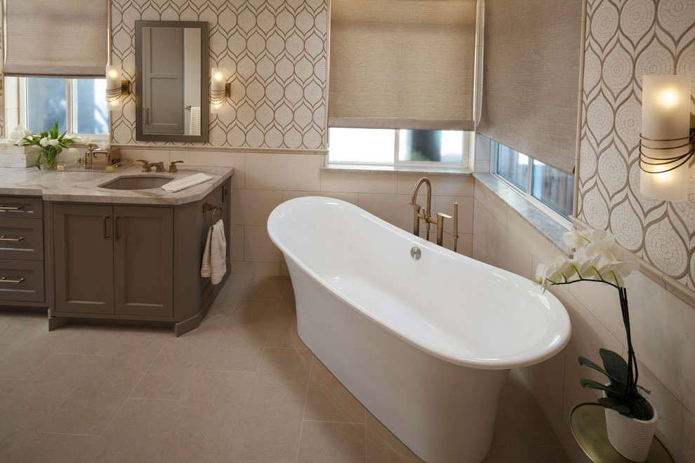 Design ideas for a large classic ensuite bathroom in San Luis Obispo with shaker cabinets, grey cabinets, a japanese bath, an alcove shower, beige tiles, multi-coloured tiles, white tiles, beige walls, travertine flooring, a submerged sink, marble worktops, beige floors, a sliding door and grey worktops.