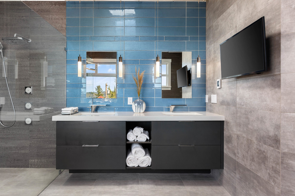 Design ideas for a large contemporary ensuite bathroom in Seattle with flat-panel cabinets, black cabinets, a built-in shower, porcelain tiles, grey walls, porcelain flooring, a submerged sink, engineered stone worktops, grey floors, an open shower, white worktops, beige tiles and blue tiles.