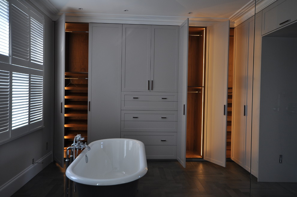 This is an example of a contemporary bathroom in London with a freestanding bath.