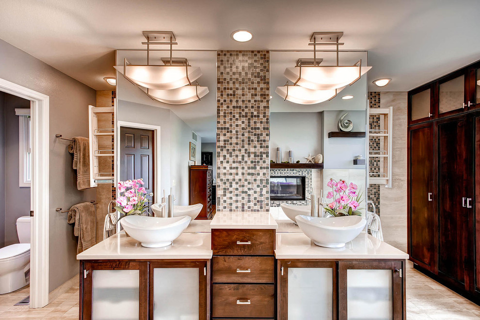 Inspiration for a large contemporary master beige tile and ceramic tile ceramic tile bathroom remodel in Denver with a vessel sink, quartz countertops, a two-piece toilet, shaker cabinets, medium tone wood cabinets and blue walls