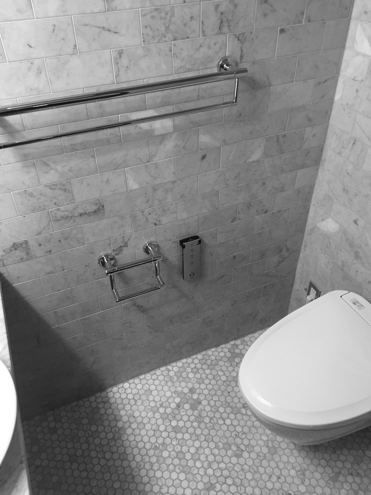 Photo of a small contemporary shower room bathroom in Other with open cabinets, a one-piece toilet, grey tiles, marble tiles, marble flooring, a vessel sink, marble worktops and grey floors.