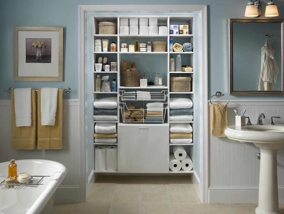Freestanding bathtub - traditional freestanding bathtub idea in Other with a pedestal sink