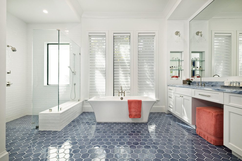 Inspiration for a large classic ensuite bathroom in Miami with open cabinets, white cabinets, a freestanding bath, white walls, porcelain flooring, engineered stone worktops, blue floors and blue worktops.