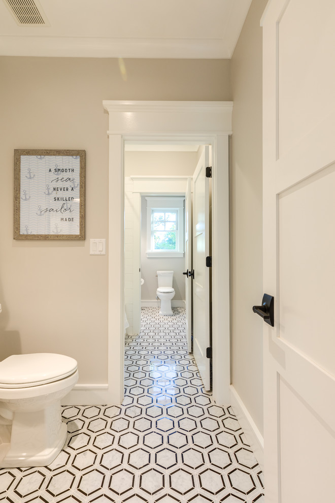 Inspiration for a mid-sized modern kids' white tile and marble tile marble floor and white floor bathroom remodel in Other with shaker cabinets, gray cabinets, a two-piece toilet, gray walls, an undermount sink, quartz countertops, a hinged shower door and white countertops