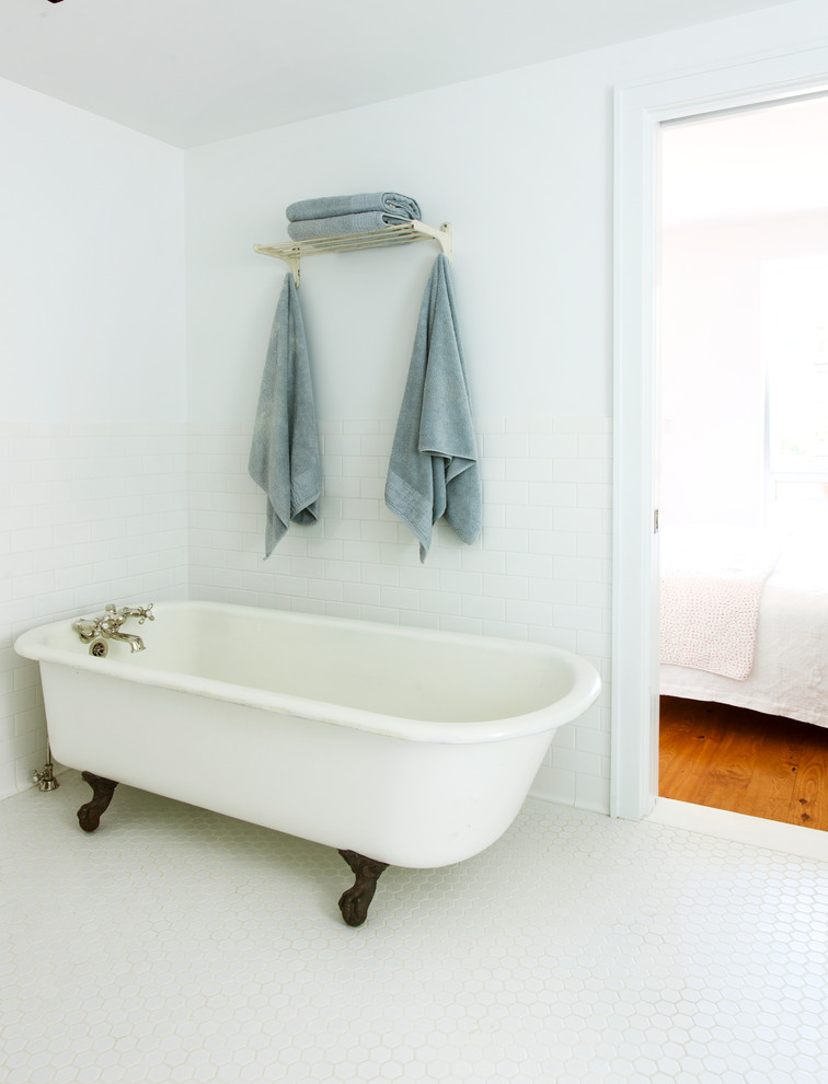 Large elegant master white tile and ceramic tile ceramic tile bathroom photo in New York with furniture-like cabinets, white cabinets, marble countertops, a two-piece toilet and white walls