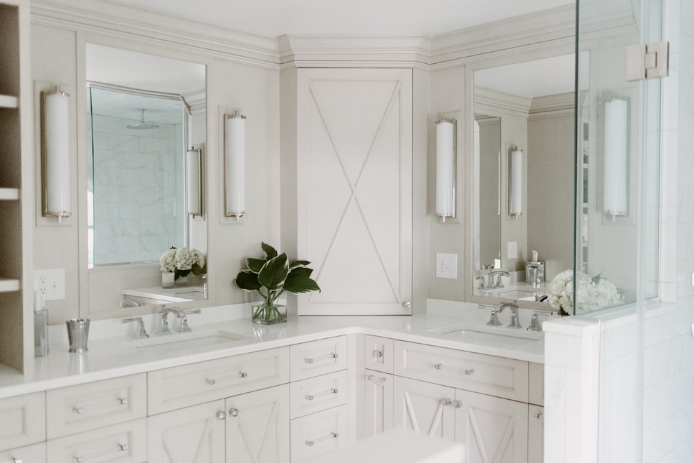 Inspiration for a large traditional ensuite bathroom in Cleveland with beaded cabinets, white cabinets, a corner shower, a two-piece toilet, white tiles, marble tiles, grey walls, dark hardwood flooring, a submerged sink, quartz worktops, brown floors and a hinged door.