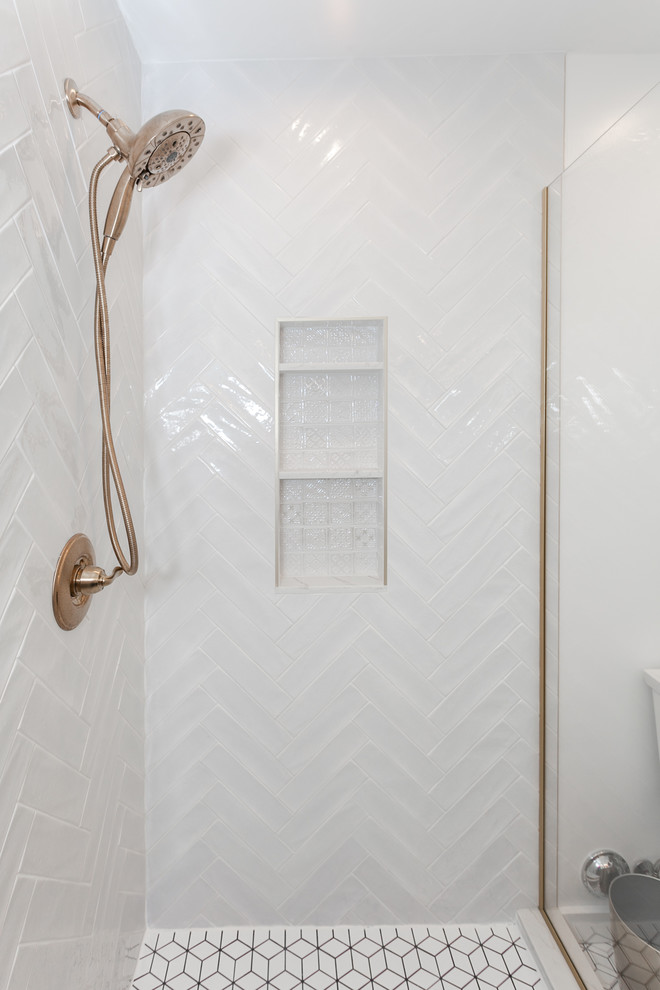 Inspiration for a mid-sized modern 3/4 white tile and subway tile porcelain tile and white floor corner shower remodel in Los Angeles with beaded inset cabinets, dark wood cabinets, a one-piece toilet, white walls, a drop-in sink, quartz countertops, a hinged shower door and white countertops
