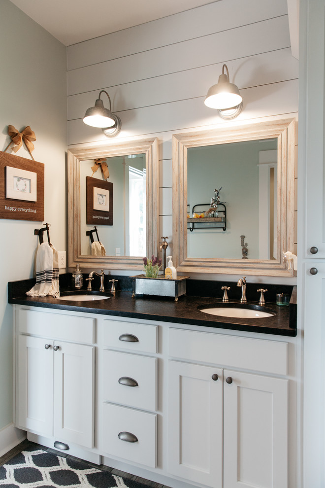 Photo of a romantic bathroom in Nashville with flat-panel cabinets, white cabinets, blue tiles and granite worktops.