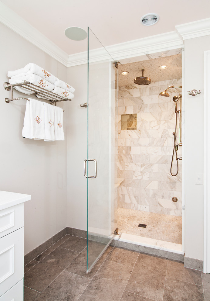 Example of a cottage master brown tile and stone tile porcelain tile alcove shower design in New York with raised-panel cabinets, white cabinets, beige walls, an undermount sink and marble countertops