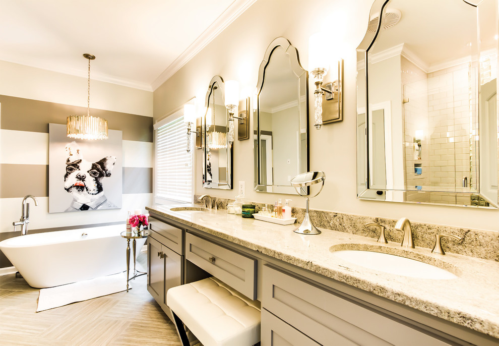 Inspiration för mellanstora klassiska en-suite badrum, med skåp i shakerstil, grå skåp, grå väggar, klinkergolv i porslin, ett undermonterad handfat, granitbänkskiva, beiget golv, ett fristående badkar, en dusch i en alkov och dusch med gångjärnsdörr