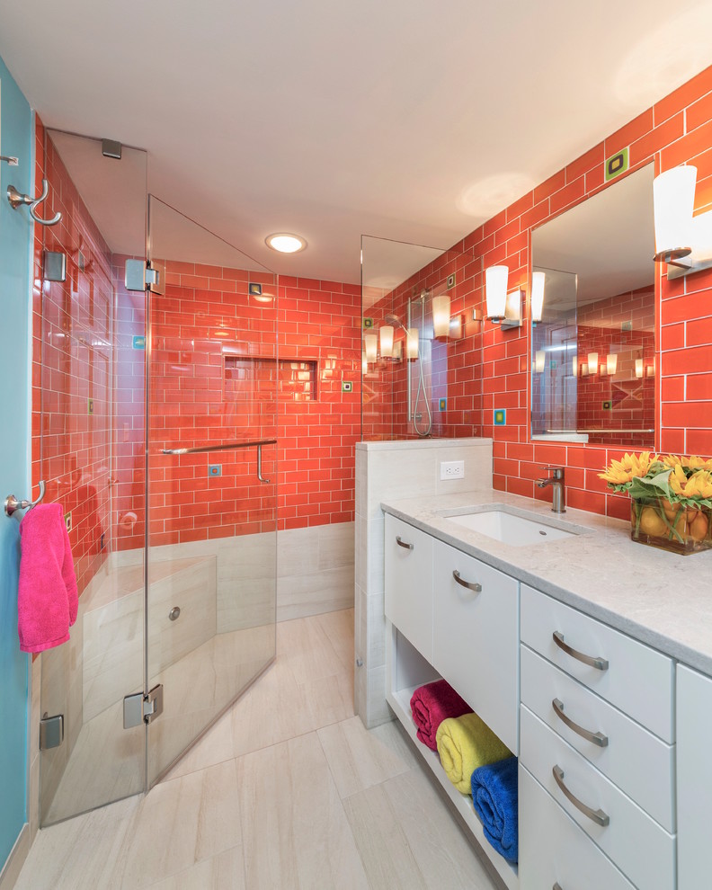 Mid-sized transitional kids' orange tile and glass tile porcelain tile and beige floor alcove shower photo in Other with flat-panel cabinets, white cabinets, a two-piece toilet, blue walls, an undermount sink, quartz countertops and a hinged shower door
