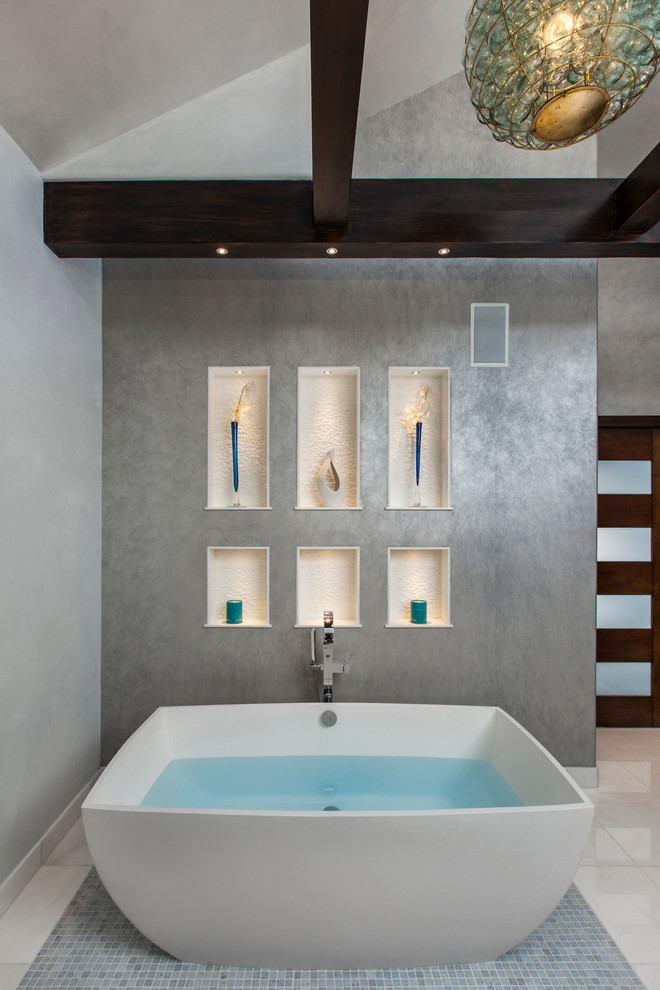 Mid-sized minimalist master blue tile and marble tile travertine floor and white floor bathroom photo in Denver with gray walls, flat-panel cabinets, medium tone wood cabinets, a two-piece toilet, an undermount sink, marble countertops and a hinged shower door
