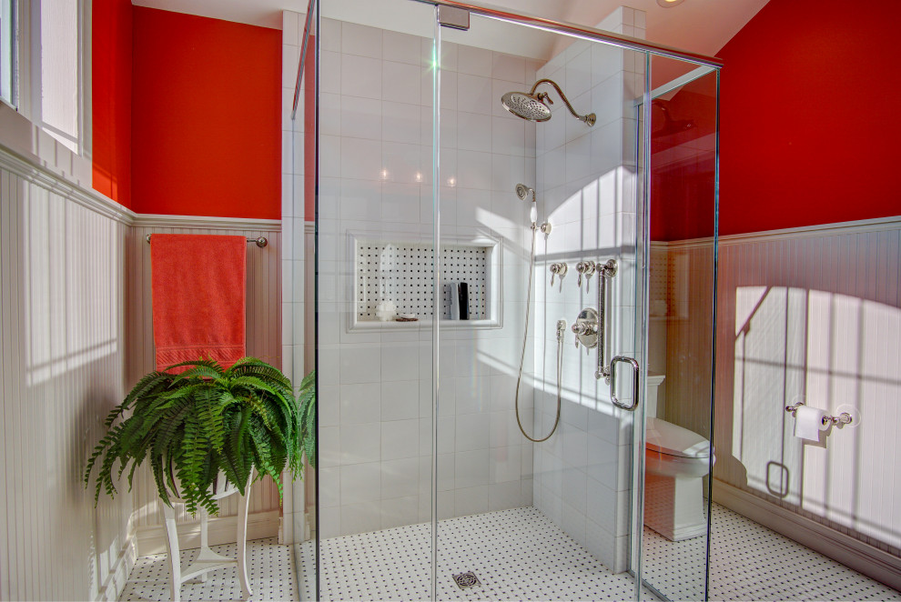 This is an example of a medium sized classic ensuite bathroom in Other with freestanding cabinets, black cabinets, a built-in shower, a two-piece toilet, white tiles, ceramic tiles, orange walls, ceramic flooring, a submerged sink, quartz worktops, black floors, a hinged door and white worktops.