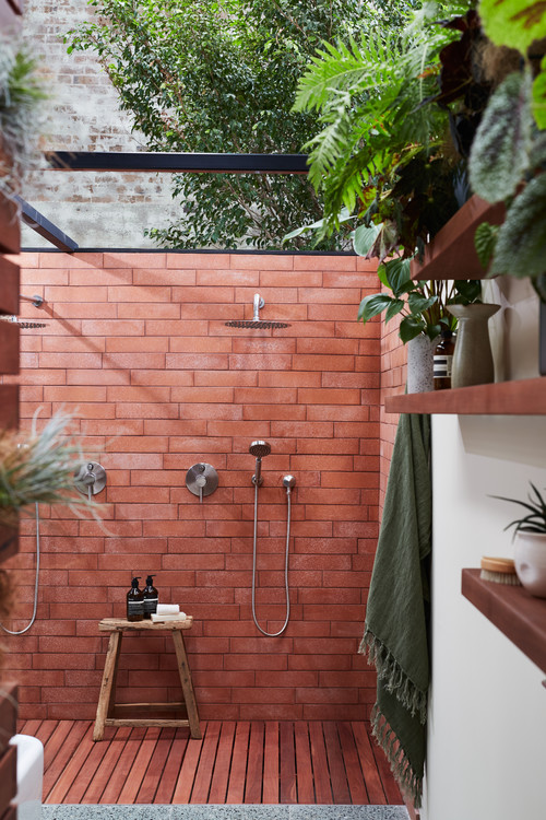 Nature Retreat: Outdoor Rustic Bath with Red Subway Allure