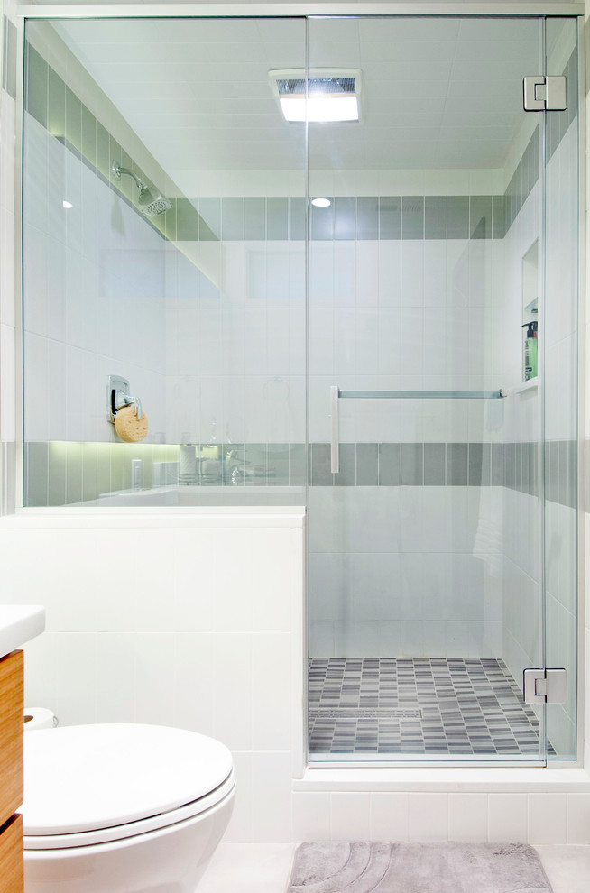 Inspiration for a medium sized retro shower room bathroom in Columbus with flat-panel cabinets, medium wood cabinets, a double shower, a two-piece toilet, grey tiles, ceramic tiles, yellow walls, ceramic flooring, a submerged sink and engineered stone worktops.
