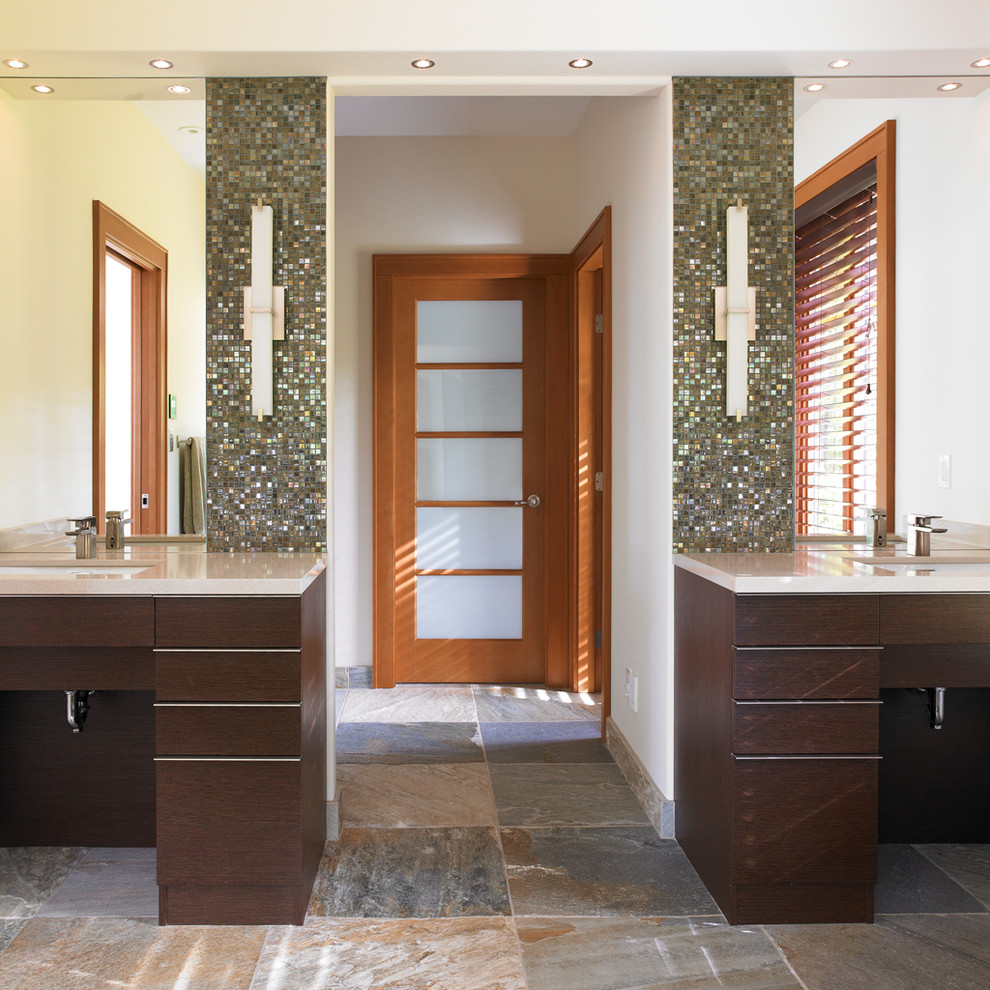 Design ideas for a modern bathroom in Vancouver with mosaic tiles and feature lighting.