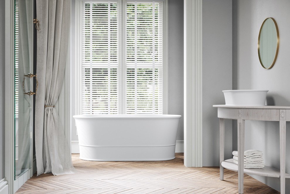 Ispirazione per una piccola stanza da bagno con doccia contemporanea con consolle stile comò, vasca freestanding e lavabo a bacinella