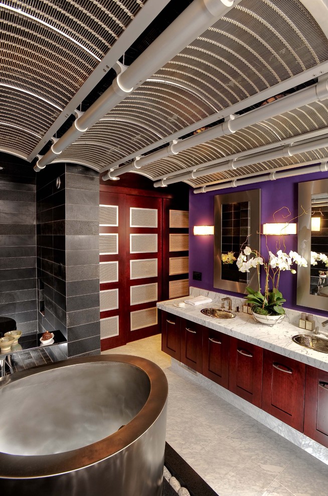 Photo of a contemporary bathroom in Other with a freestanding bath.