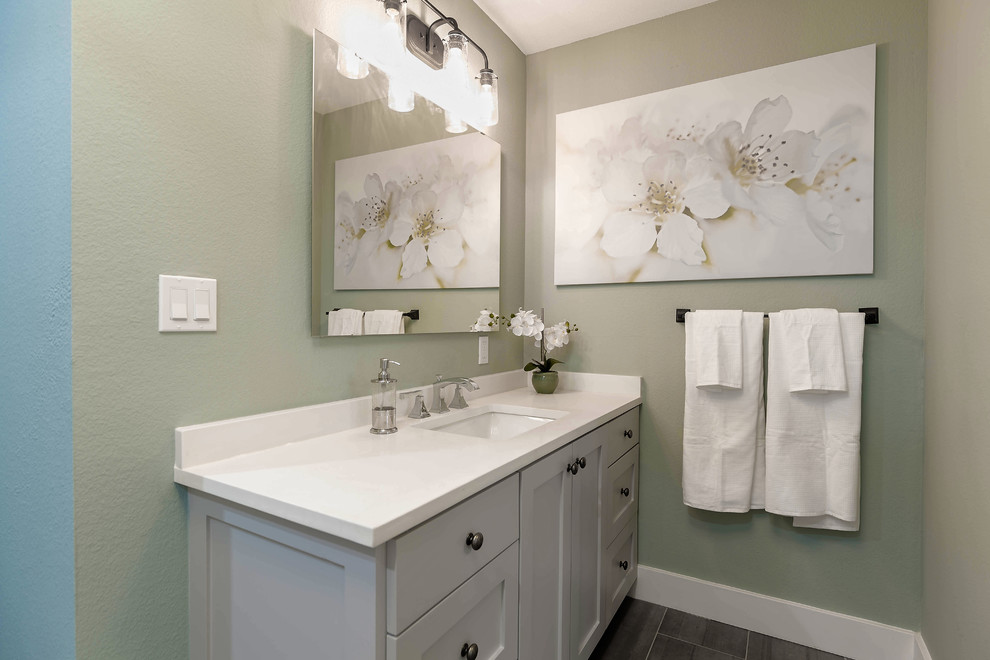 Small classic family bathroom in Dallas with shaker cabinets, white cabinets, an alcove shower and porcelain flooring.