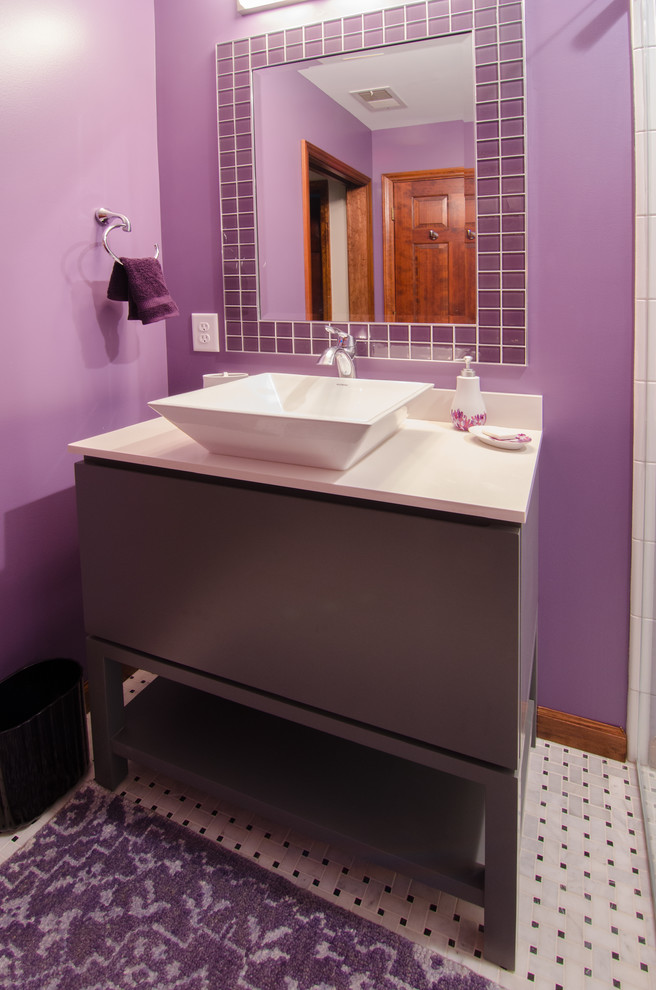 Inspiration for a small contemporary bathroom in Raleigh with freestanding cabinets, grey cabinets, a one-piece toilet, porcelain tiles, porcelain flooring, quartz worktops, a built-in shower, black and white tiles, purple walls, a vessel sink, a hinged door and white floors.