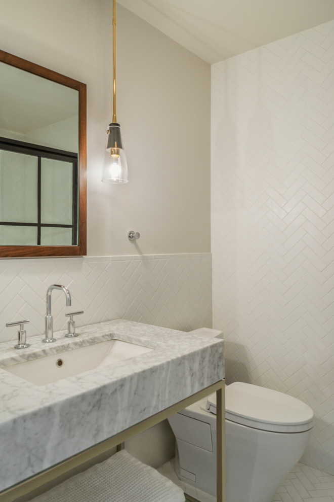 This is an example of a small modern shower room bathroom in Seattle with a one-piece toilet, white tiles, metro tiles, white walls, ceramic flooring, a submerged sink, marble worktops, grey worktops, open cabinets, a single sink and a freestanding vanity unit.