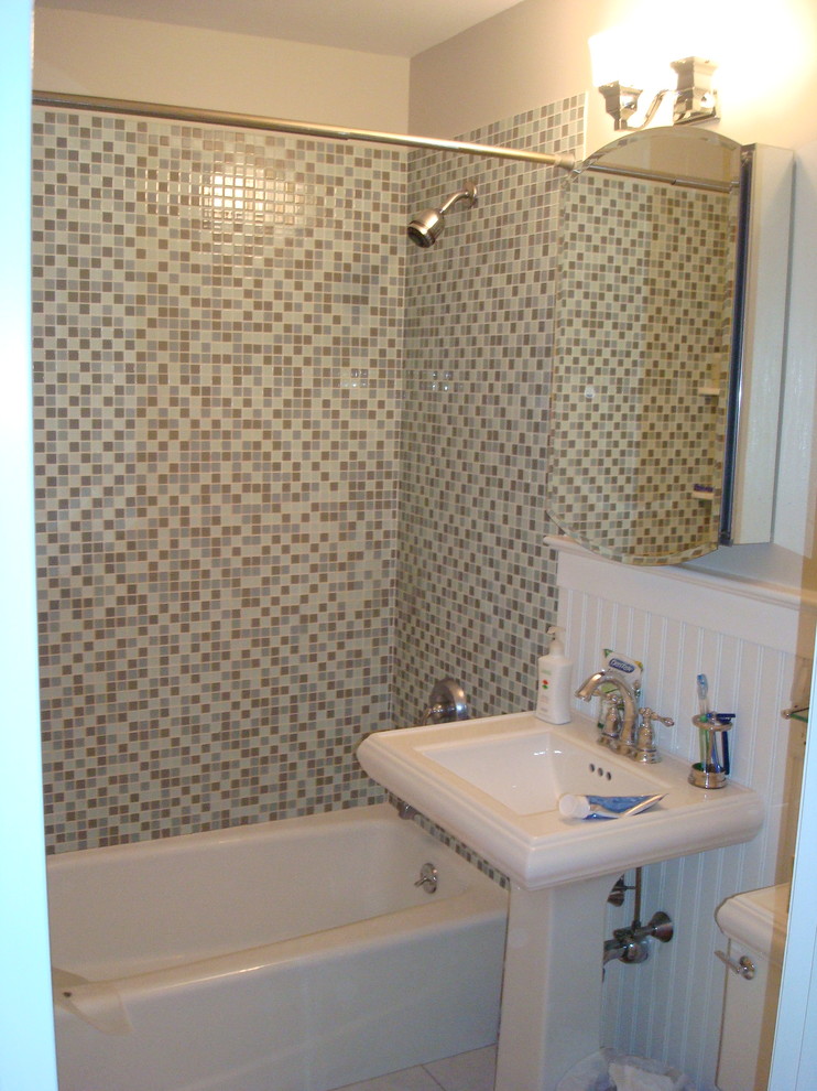 Example of a small classic kids' multicolored tile ceramic tile bathroom design in New York with a pedestal sink, a two-piece toilet and beige walls