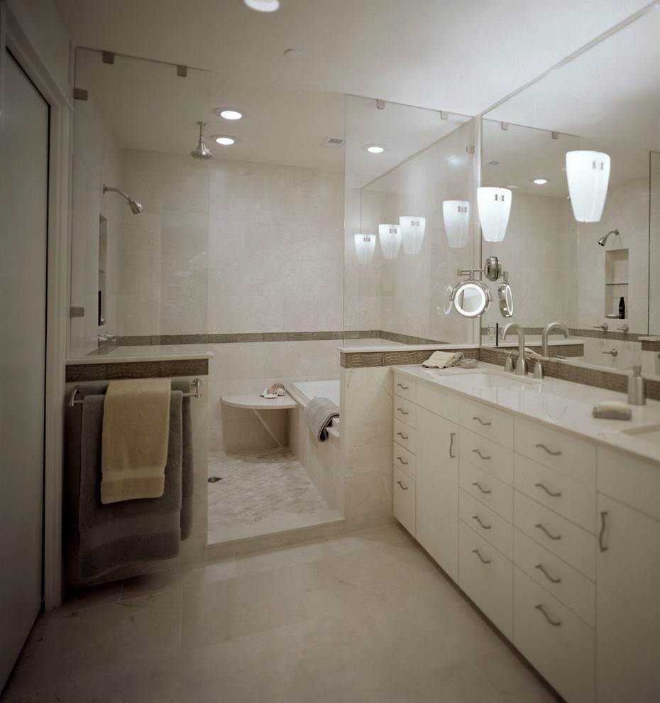 Bathroom - mid-sized contemporary master beige tile and marble tile beige floor and marble floor bathroom idea in Austin with beige walls, flat-panel cabinets, beige cabinets, an undermount sink and marble countertops