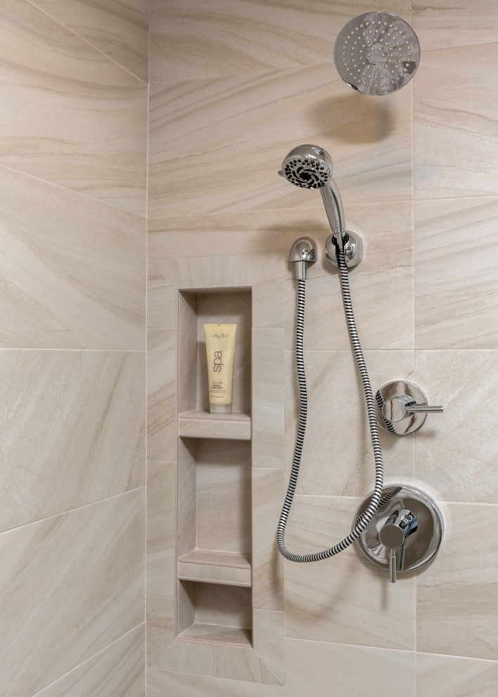 This is an example of a large nautical ensuite bathroom in Other with flat-panel cabinets, white cabinets, a walk-in shower, a two-piece toilet, multi-coloured tiles, porcelain tiles, white walls, porcelain flooring, a submerged sink, engineered stone worktops, brown floors and an open shower.
