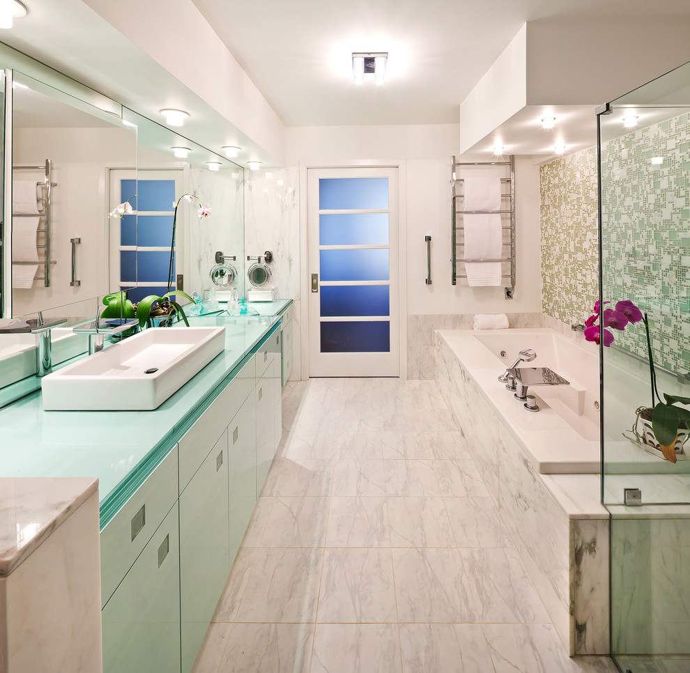 Inspiration for a medium sized contemporary ensuite bathroom in Houston with a vessel sink, flat-panel cabinets, glass worktops, a built-in bath, a built-in shower, green tiles, white walls, marble flooring, green cabinets, white floors and a hinged door.