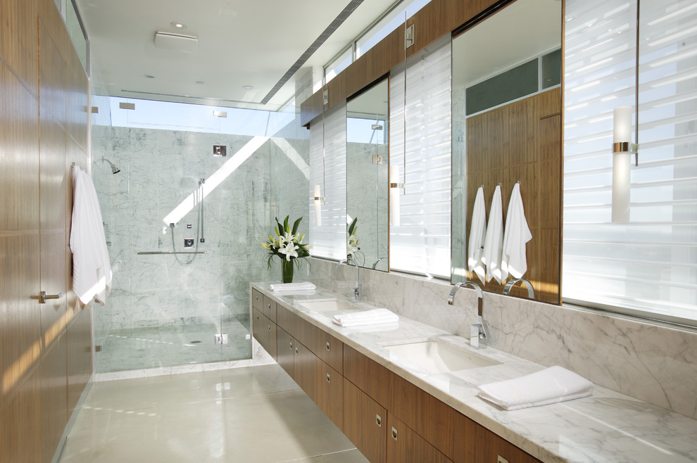 Example of a trendy bathroom design in Sacramento with marble countertops