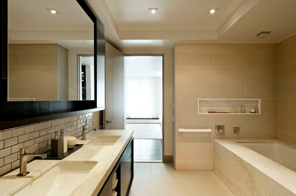 Example of a trendy subway tile bathroom design in New York