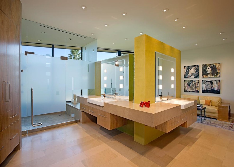 Immagine di una stanza da bagno minimal con lavabo da incasso