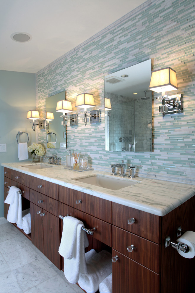 This is an example of a contemporary bathroom in Boston with dark wood cabinets and feature lighting.