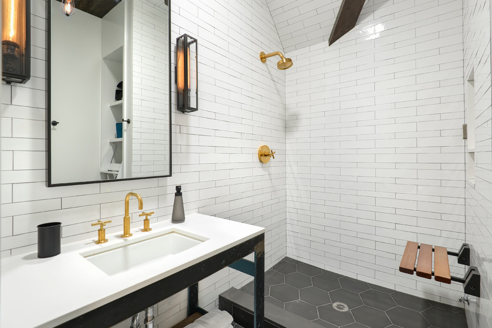 Trendy white tile bathroom photo in Chicago with an undermount sink